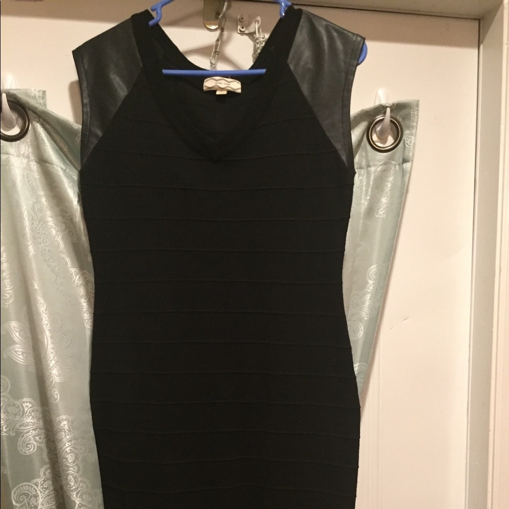Black Mid/ Mini bodycon type dress.Only worn once